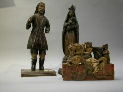 Painted Carved Wood Figures of St. George with Dragon and Two Santos. 